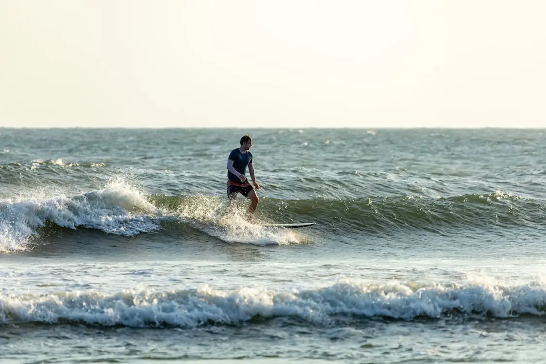surfing in canggu
